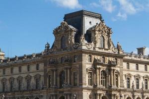 PARIS - JUNE 7 - Louvre building on June 7, 2012 in Louvre Museum, Paris, France. With 8.5m annual visitors, Louvre is consistently the most visited museum worldwide. photo