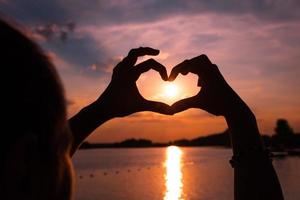 Sunset in heart shape. photo