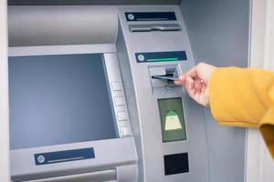 Withdrawing money from ATM. photo