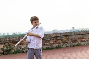 Cute little flautist. photo