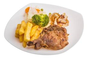 T-bone steak on the plate and white background photo