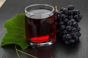 Grape juice and berries photo