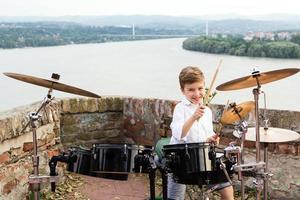 When I go grow up, I'll be a drummer. photo