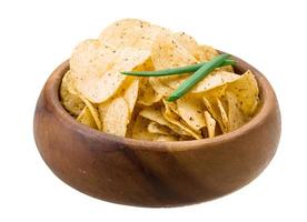 Potato chips in a bowl on white background photo