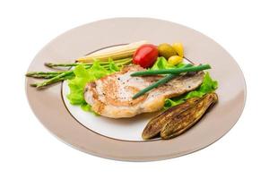 T-bone steak on the plate and white background photo