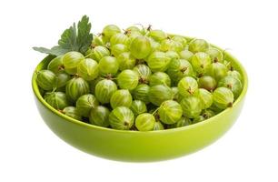 Gooseberry in a bowl on white background photo