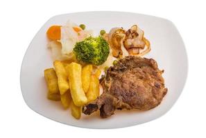 T-bone steak on the plate and white background photo