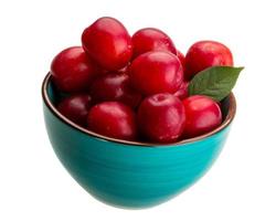 Damson plum in a bowl on white background photo