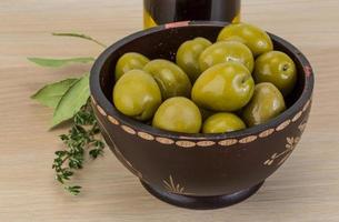 Marinated green olives photo