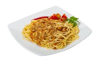 Bolognese spaghetti on the plate and white background photo