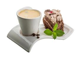 Coffee with cake on white background photo