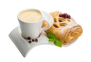 Coffee with pastry on white background photo