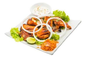 Tandori Chicken on the plate and white background photo