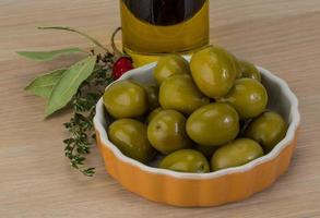 Marinated green olives photo