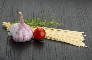 Rice noodles on wooden background photo