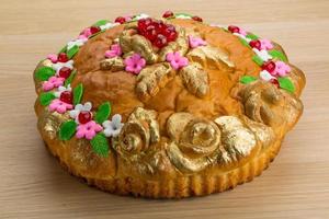 Karavay - Russian traditional bread on wooden background photo