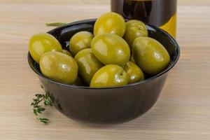 Marinated green olives photo