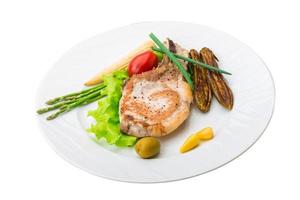 T-bone steak on the plate and white background photo