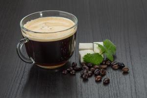 Espresso on wooden background photo