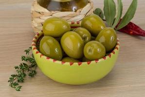 Marinated green olives photo