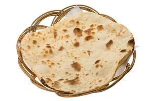 Plain Naan in a basket on white background photo