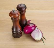 Red onion and pepper mill photo