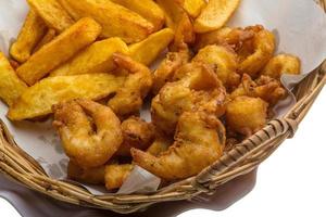 Seafood basket in a basket on white background photo