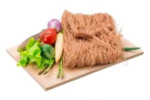 Raw rice noodles photo