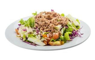 Tuna salad on the plate and white background photo