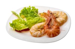 Boiled king prawns Tiger prawn on the plate and white background photo