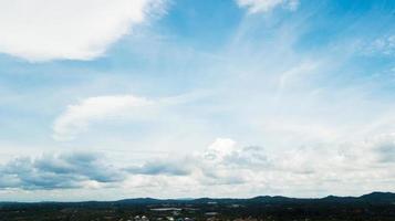 Blue sky with white clouds photo