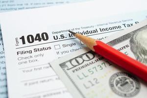 Tax form 1040 U.S. Individual Income Tax Return, business finance concept. photo