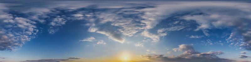 Seamless blue sky before sunset hdri panorama 360 degrees angle view with beautiful clouds for use in 3d graphics or game development as sky dome or edit drone shot photo