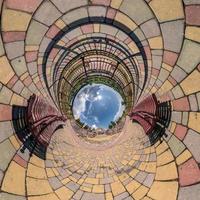 Abstract view of little planet transformation of spherical panorama 360 degrees. Spherical abstract aerial view on wooden bridge. Curvature of space. photo