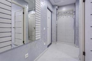 door in modern entrance hall of corridor in apartments photo