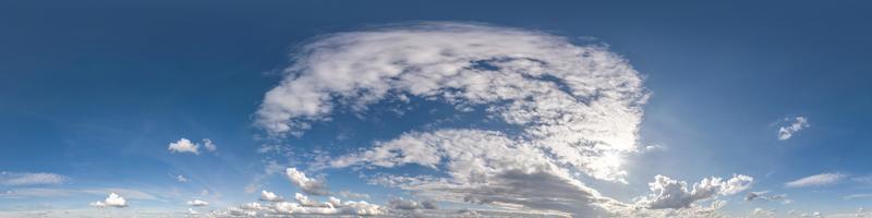 Seamless blue sky hdri panorama 360 degrees angle view with beautiful clouds with zenith for use in 3d graphics as sky dome or edit drone shot photo