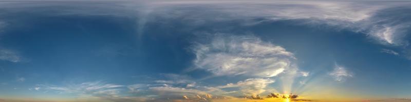 hdri 360 panorama of sunset sky with white beautiful clouds in seamless projection with zenith for use in 3d graphics or game development as sky dome or edit drone shot for sky replacement photo