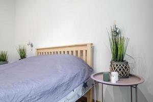 Interior of modern luxure bedroom in studio apartments in light color style photo