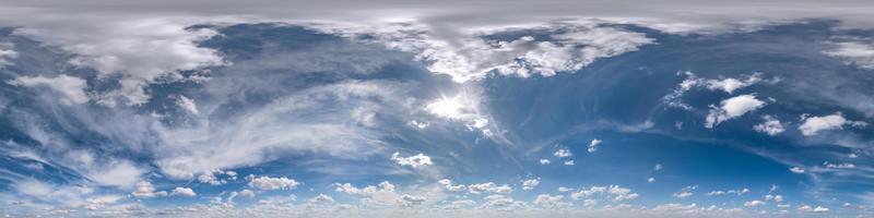 Seamless cloudy blue sky hdri panorama 360 degrees angle view with beautiful clouds  with zenith for use in 3d graphics or game as sky dome or edit drone shot photo