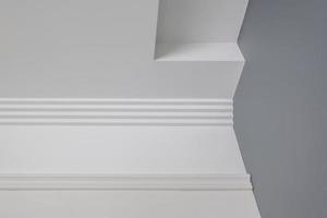 Detail of corner ceiling cornice with intricate crown moulding. photo