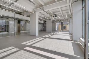 Modern white empty room interior with columns and panoramic windows.  room for office or store photo