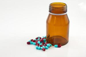 Pills with brown bottle photo