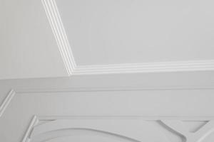 Detail of corner ceiling cornice with intricate crown moulding. photo