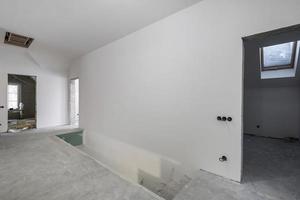 empty white room with concrete stair without repair and furniture photo