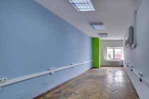 empty white room with repair and without furniture. room for office or clinic photo