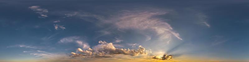 hdri 360 panorama of sunset sky with white beautiful clouds in seamless projection with zenith for use in 3d graphics or game development as sky dome or edit drone shot for sky replacement photo