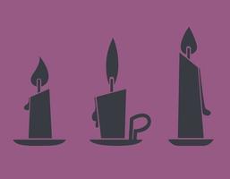 Set of candle on stands in black flat style. vector