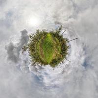 tiny planet transformation of spherical panorama 360 degrees. Spherical abstract aerial view in Apple orchard. Curvature of space. photo