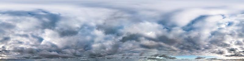 blue sky with beautiful evening cumulus clouds. Seamless hdri panorama 360 degrees angle view with zenith for use in graphics or game development as sky dome or edit drone shot photo