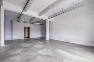 empty white room with repair and without furniture. room for office or clinic photo